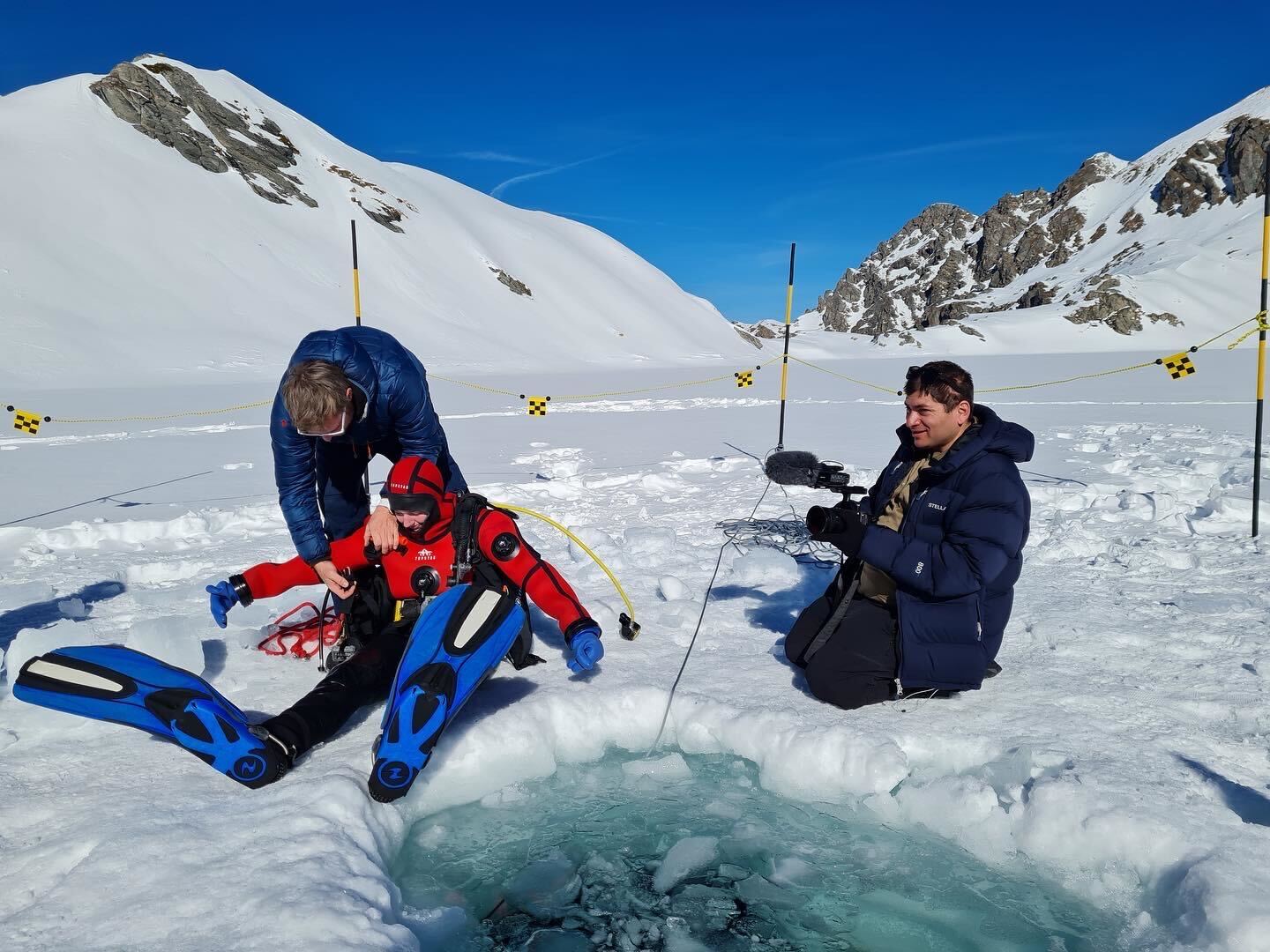 Participants ice diving in the Asclepios astronaut training program