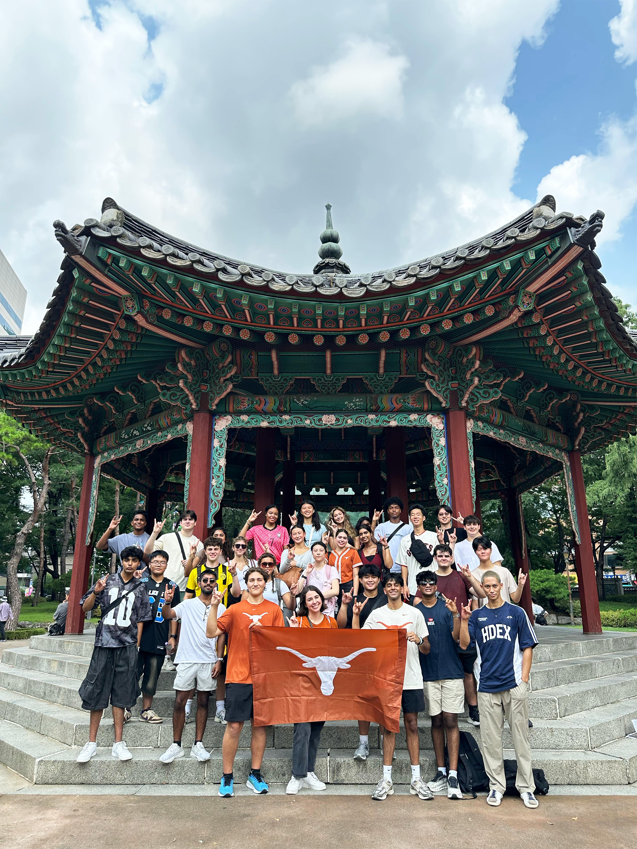 Students visiting a Korean temple pavilion