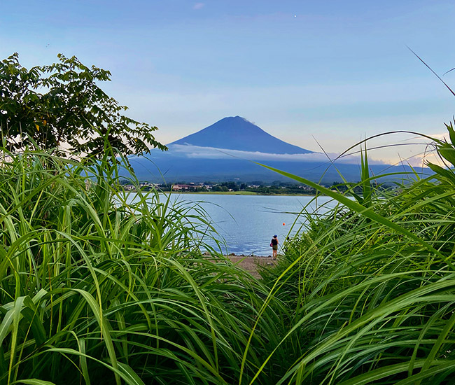 View of Mount Fuji across a lake