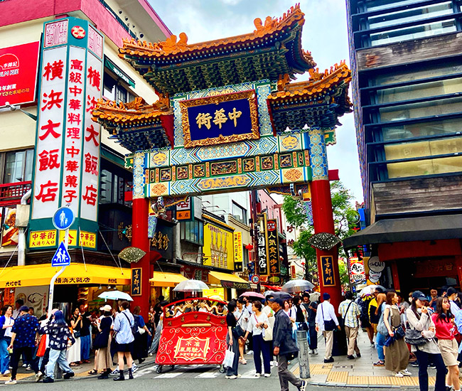 Busy street scene in a Japanese Chinatown